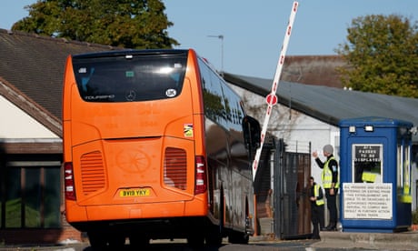 A coach carrying a group of people thought to be migrants arriving at the Manston immigration short-term holding facility in Thanet, Kent