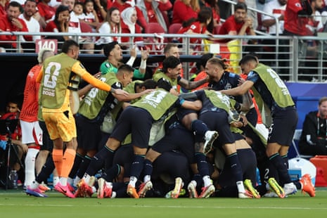 Paraguay players celebrate a goal scored together during the World Cup 2026 Group D soccer match between Turkiye and Paraguay.