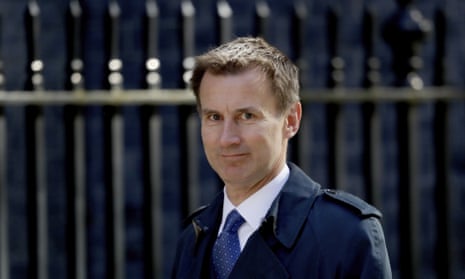 Jeremy Hunt arrives for a cabinet meeting at 10 Downing Street in London.