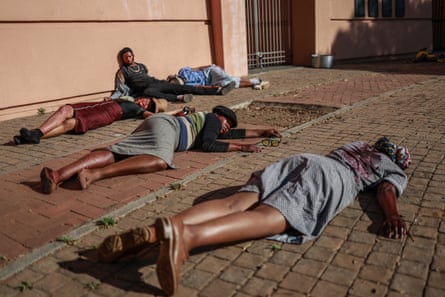 Performers re-enact the Sharpeville massacre at the memorial site for victims on 3 September.