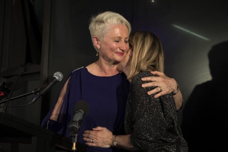 Independent candidate for Wentworth Kerryn Phelps (left) is embraced by her wife Jackie Stricker-Phelps during her victory speech.