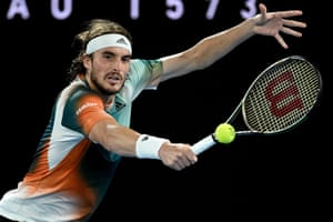 Stefanos Tsitsipas plays a backhand return.