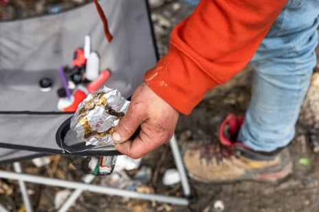 a man holds a piece of foil
