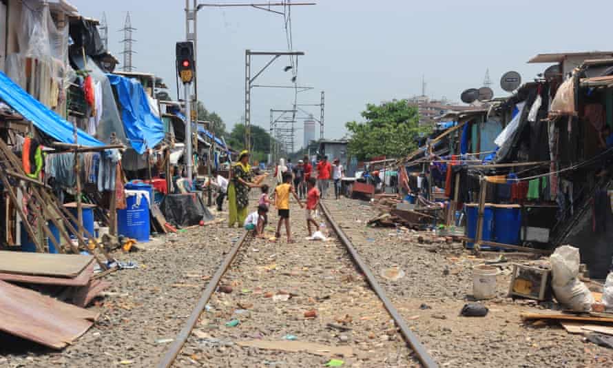 Shacks along railway line in Mumbai’s Kurla East slum