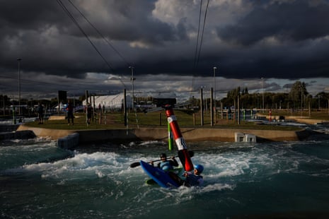 Tadeusz Kuchno of Poland battles with Ondrej Tunka of the Czech Republic as they practise kayak cross technique on the Legacy Loop during the final day of practice before the ICF Canoe Slalom World Championships 2023 at the Lee Valley White Water Centre.