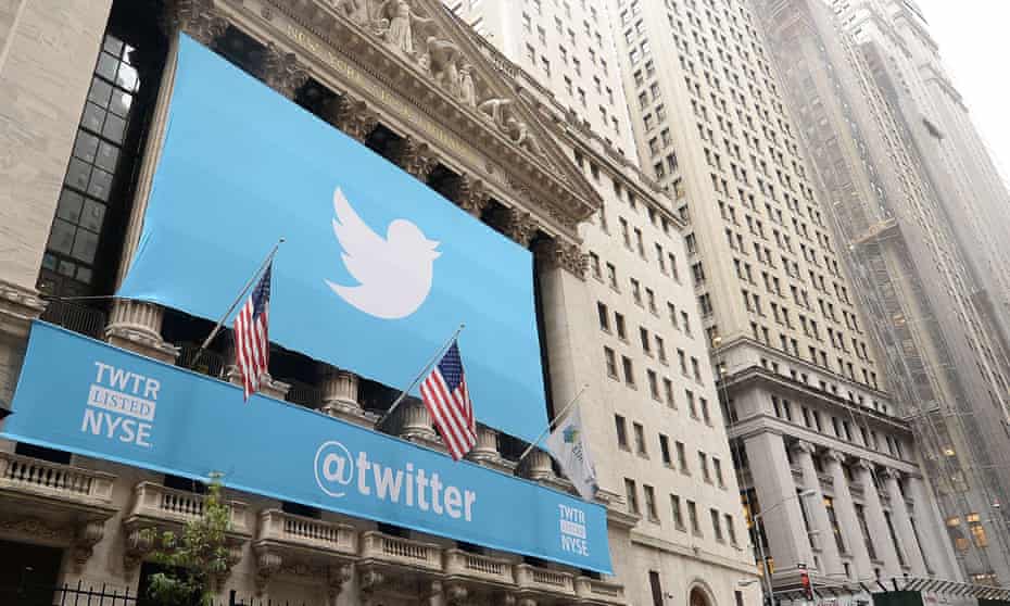 A banner with Twitter’s logo on the front of the New York Stock Exchange.