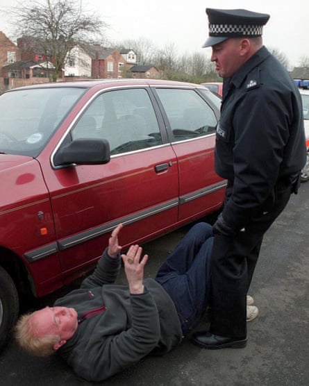 Les Battersby, played by Bruce Jones, getting into a fight after being stopped for jumping a red light.