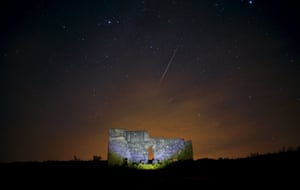 Ronda, Spain Meteors streak across the sky over a Roman theatre in the ruins of Acinipio