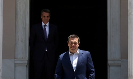 Alexis Tsipras, right, walks away from his successor, Kyriakos Mitsotakis