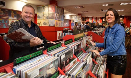 Anthony Albanese poses for a photograph with country musician Amber Lawrence at Red Eye Records in Sydney in March 2018.