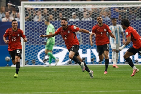 Egypt's Yasser Ibrahim (centre) celebrates scoring their first goal.