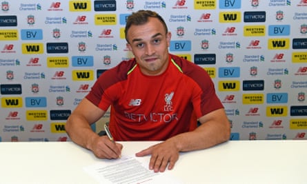 Xherdan Shaqiri puts pen to paper for Liverpool