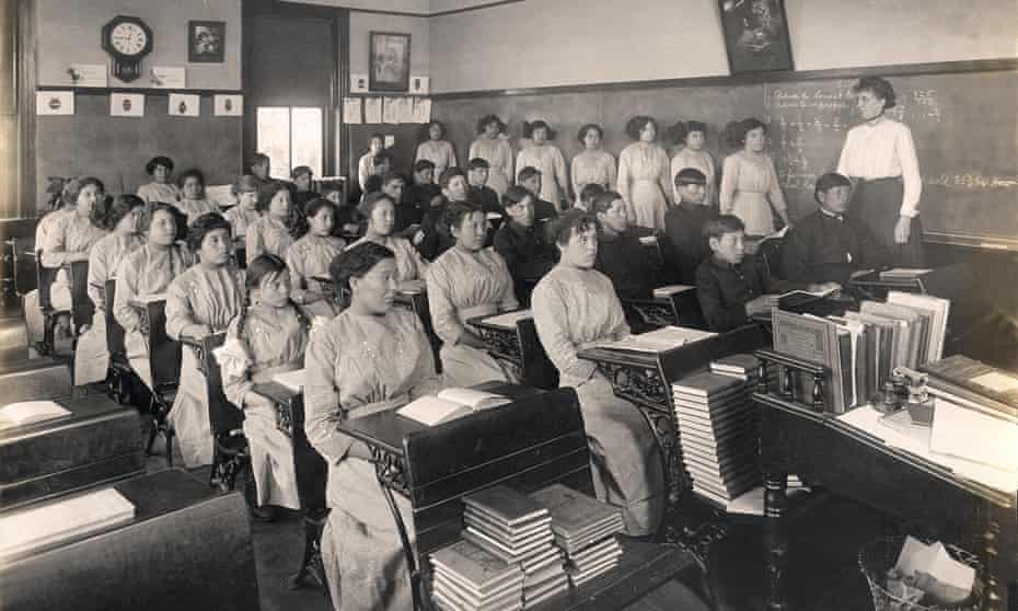 A fifth-grade class is seen at the Genoa US Indian Industrial School in Nebraska in 1910.