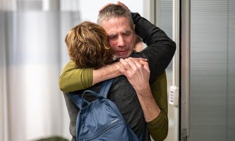 Fernando Simon Marman being reunited with his family at the Tel Hashomer hospital in Ramat Gan, on the outskirts of Tel Aviv.