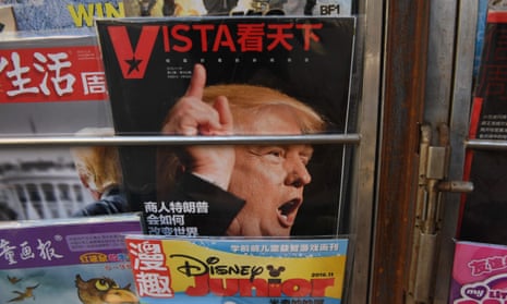 A magazine features a cover story about Donald Trump on a news stand in China