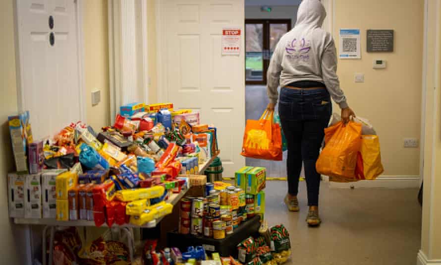 A volunteer at work in a food bank in north London, October 2020.