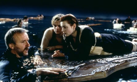 James Cameron with DiCaprio and Winslet on the set of the film