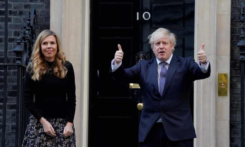 Boris Johnson and his then fiancee, Carrie Symonds, in the doorway of 10 Downing Street in central London on 15 May 2020.