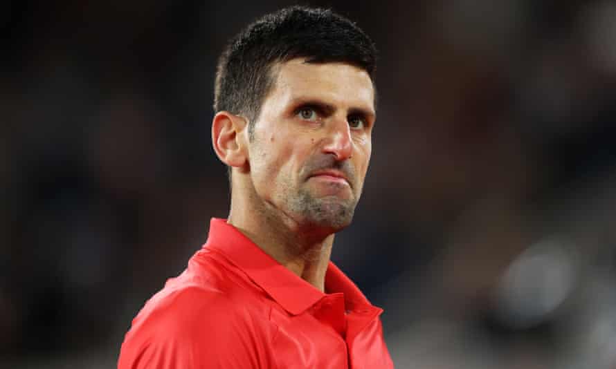 Novak Djokovic reacts against Rafael Nadal.