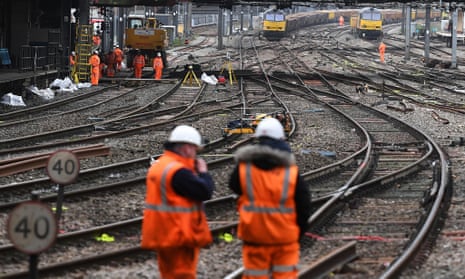 Network Rail staff work on tracks at a closed Paddington station in London in 2016.