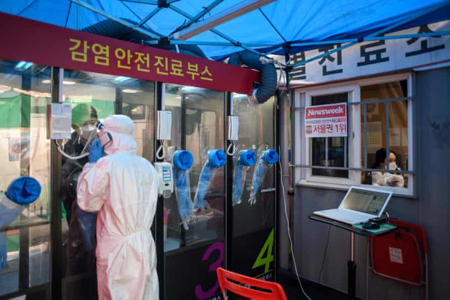 A nurse at testing booth outside the Yangji hospital in Seoul.