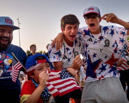 Fans react to a goal by the USA while watching a broadcast of the FIFA World Cup Round of 32 match between the USA and Bosnia