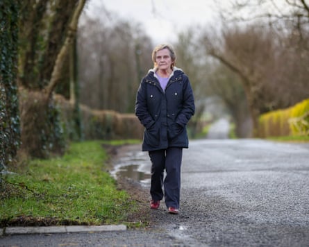 Pam Morrison walking along a country lane