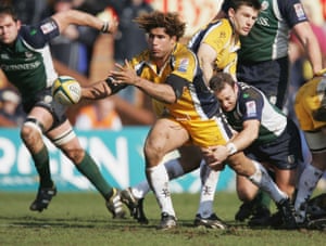 Richard Parks passes the ball out during the Powergen Cup semi-final between Leeds Tykes and London Irish at Headingley in March 2005.