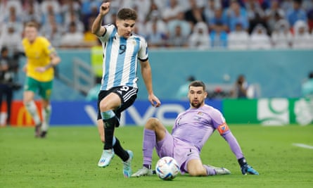 Julián Álvarez takes the ball off Australia goalkeeper Mathew Ryan to double Argentina’s lead.