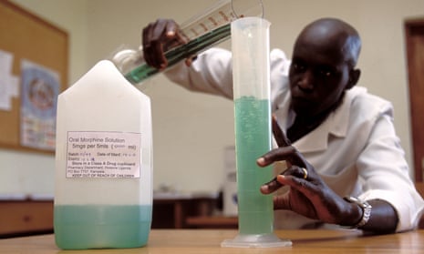 Morphine is carefully measured for palliative care of HIV Aids patients at a hospice in Uganda. 
