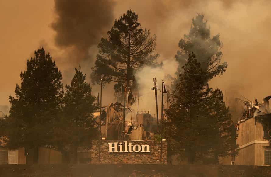 Smoke continues rises from the Hilton Sonoma Wine Country in Santa Rosa, California, during the Tubbs fire in 2017.