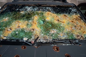 A bullet-ridden car caught in Sinaloa cartel shoot-out.