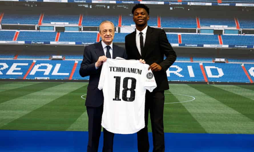 Tchouaméni ‘wants to leave his mark on history’ with evolving Real Madrid | Real Madrid 4 Aurélien Tchouaméni poses with his Real Madrid shirt alongside president Florentino Pérez at the Bernabéu.