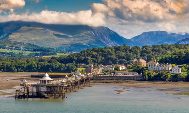 Bangor, north Wales, with the mountains of Snowdonia rising behind.