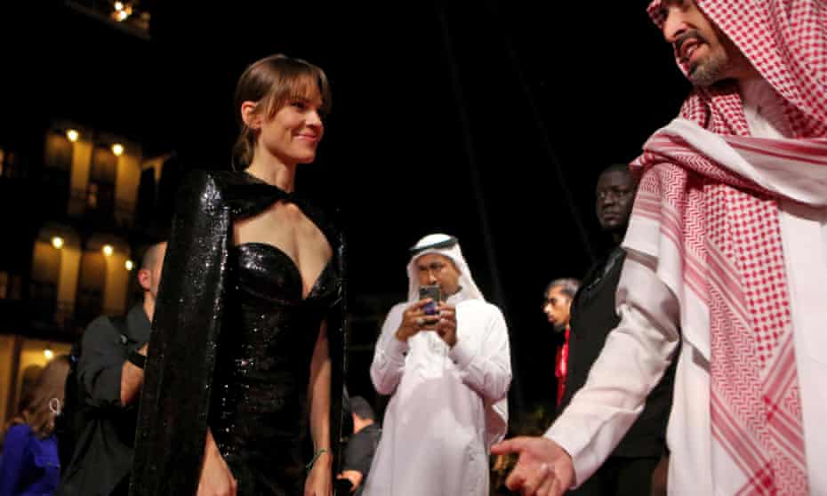 chairman Mohammed al Turki welcoming US actress Hillary Swank upon her arrival at the opening of the first edition of the festival in Jeddah.