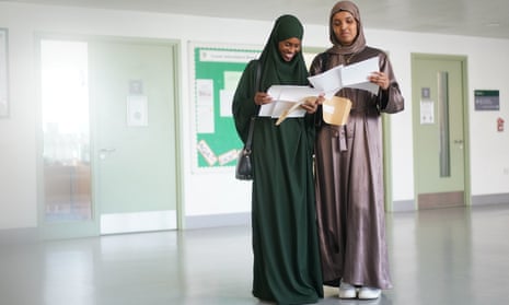 Nagma Abdi and Zuhoor Haibe read their A-level results at Ark Putney academy, south-west London.