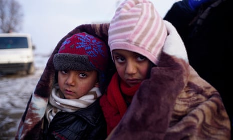 Children cross the Macedonia-Serbia border.