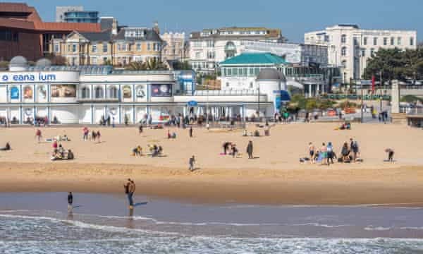 People on Bournemouth beach, Dorset