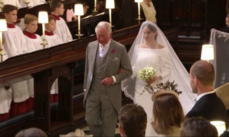 Meghan Markle walks down the aisle with Prince Charles at St George’s Chapel