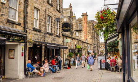  a cobbled Street lined with Restaurant and Shops in Harrogate