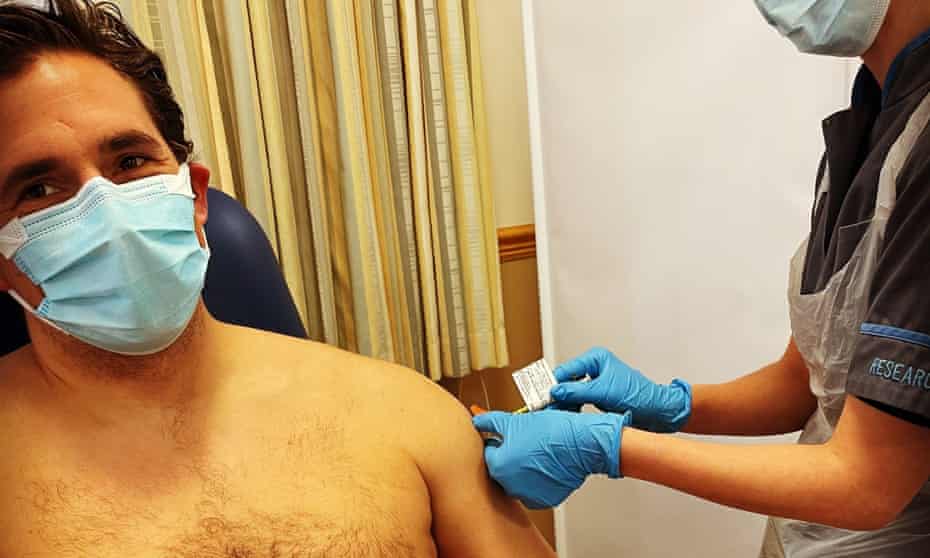Shirtless Johnny Mercer MP received a covid vaccine