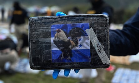 A pack of the seized cocaine with a Honduran flag and an image of a cockerel on the front.