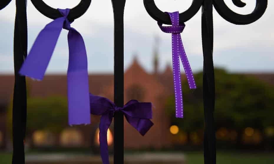 Purple ribbons are seen tied to the gates of Knox Grammar School