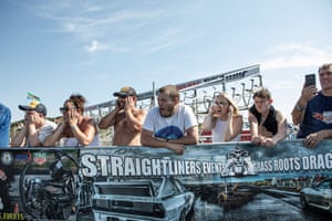 Spectators cover their ears.