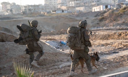 Israeli soldiers operate in the Gaza Strip amid the ongoing ground operation.