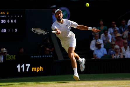 Novak Djokovic goes for a forehand on Centre Court.