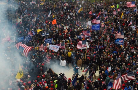 Trump supporters clash with police and security forces as they storm the US Capitol in Washington D.C on January 6, 2021. - Demonstrators breeched security and entered the Capitol as Congress debated the a 2020 presidential election Electoral Vote Certification. (Photo by ROBERTO SCHMIDT / AFP) (Photo by ROBERTO SCHMIDT/AFP via Getty Images)