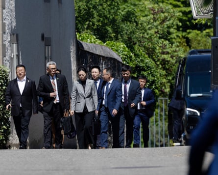 Members of the Chinese delegation after leaving the trade talks in Geneva, Switzerland, on Saturday