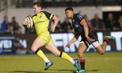 Freddie Burns of Leicester runs clear to score their fourth try in the victory over Saracens.