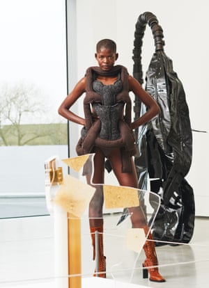 Model in front of Anthea Hamilton and Eva Rothschild artworks at JW Anderson exhibition at Hepworth Wakefield